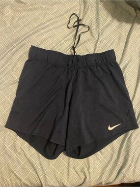Nike Women’s Black Athletic Shorts with White Swoosh